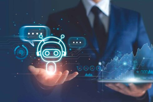 Businessman holding digital chatbot are assistant conversation for provide access to data growth of business in online network, Robot application and global connection, AI, Artificial intelligence.